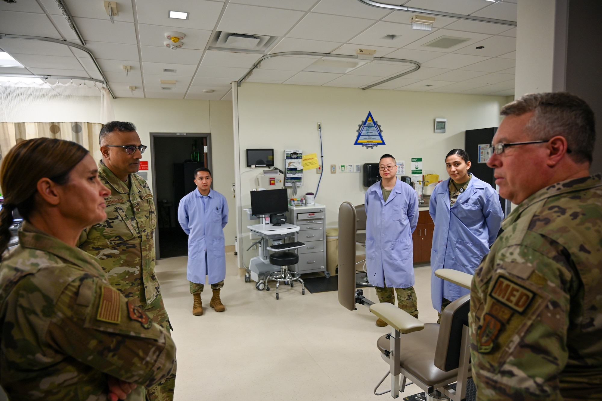 Col. Robert Simmons, 433rd Aerospace Medicine Squadron commander, briefs Brig. Gen. Kristin A. Hillery, Mobilization Assistant to the Commander, Air Force Medical Command, during a tour of medical facilities at Joint Base San Antonio-Lackland, Texas on Jan. 11, 2025.