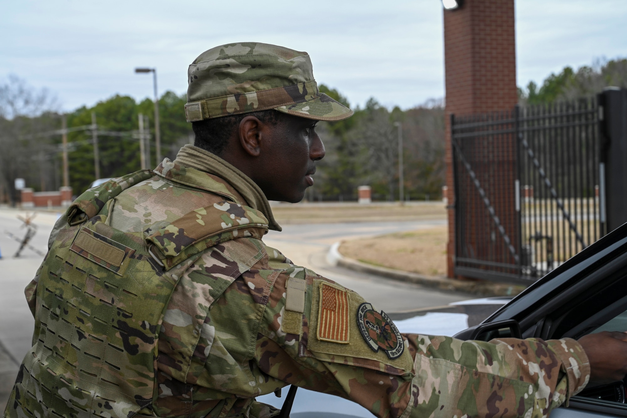 An Airman checks an ID.