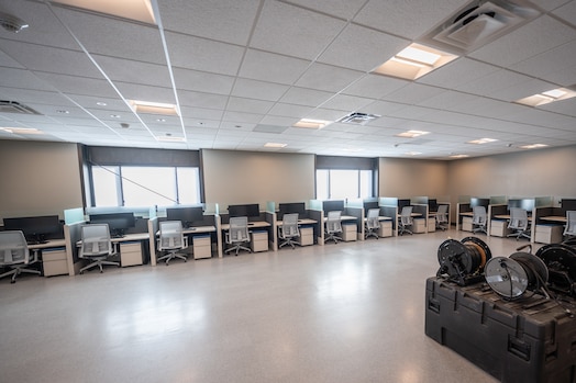  On Feb. 7, a ribbon-cutting ceremony marked the completion of a $3.55 million renovation transforming the historic hangar into a state-of-the-art facility. The remodel included modern infrastructure, over 100 Sensitive Compartmented Information Facility workstations, and a 28-seat classroom, ensuring the hangar could support Space Delta 7’s intelligence, surveillance, and reconnaissance operations.