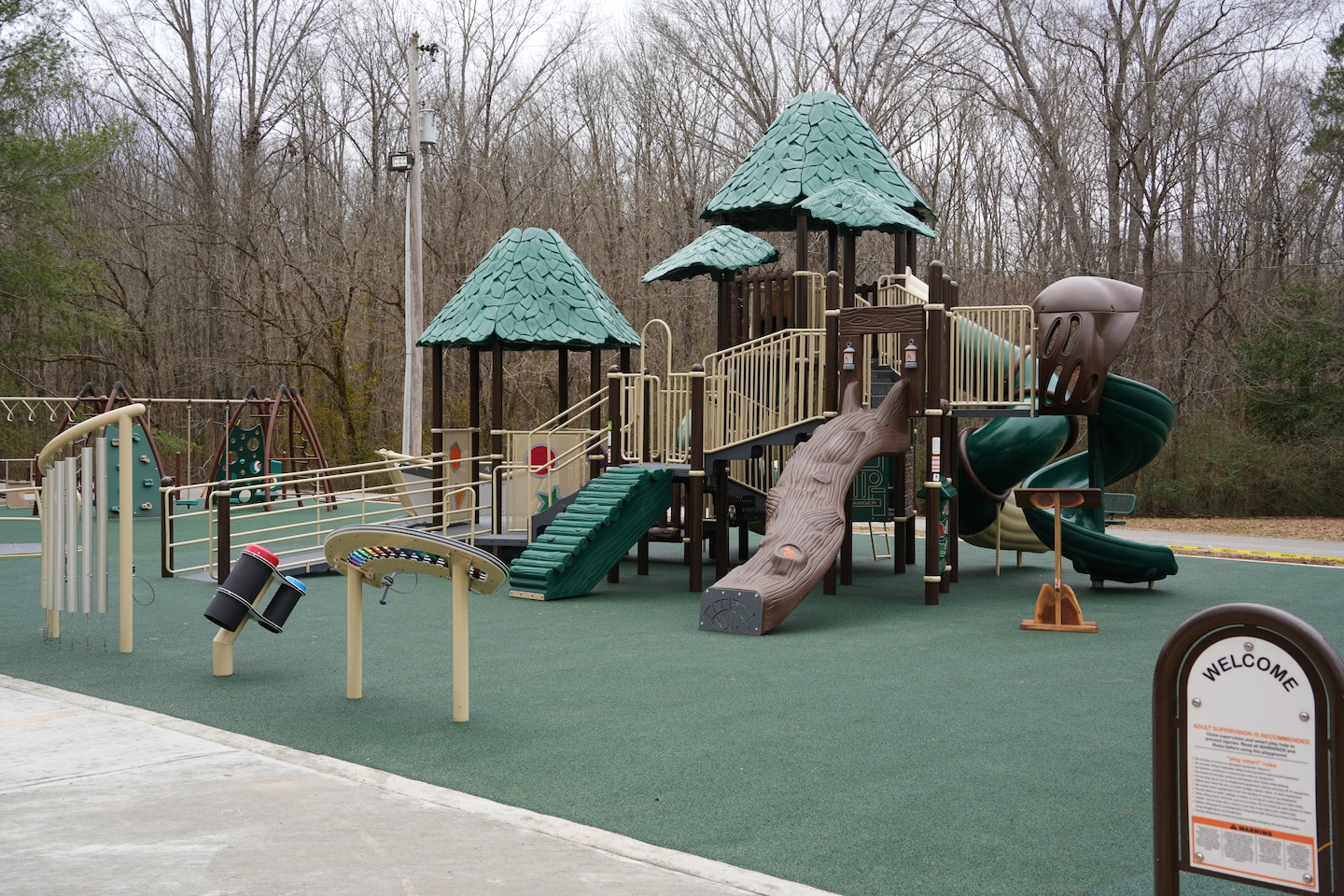 The newly completed accessible playground at Cadiz Recreation Area near Lake Barkley in Cadiz, Kentucky, stands ready for visitors following a ribbon-cutting ceremony on Feb. 7, 2025. The project, a collaboration between the U.S. Army Corps of Engineers Nashville District and local partners, features a wheelchair-friendly rubber surface and inclusive play structures, enhancing recreational opportunities for the community.