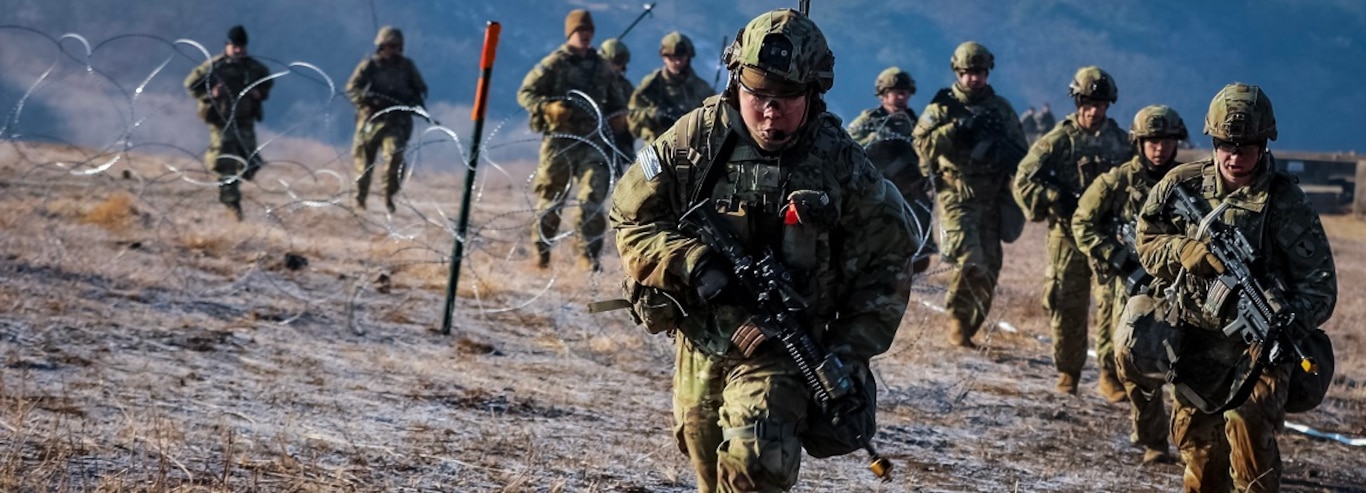 U.S. Army Soldiers assigned to the 2nd Battalion, 3rd Infantry Regiment, Korean Rotational Force, 2nd Infantry Division/Republic of Korea-United States Combined Division (2nd Inf. Div./ROK-U.S.), along with ROK Army Soldiers, move towards their next objective during a live-fire exercise (LFX) at the Rodriguez Live Fire Complex in Pocheon, Republic of Korea, on Jan. 23, 2025.