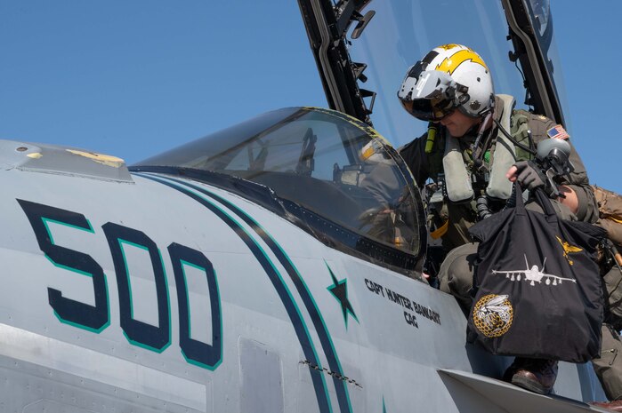 pilot entering an F-18