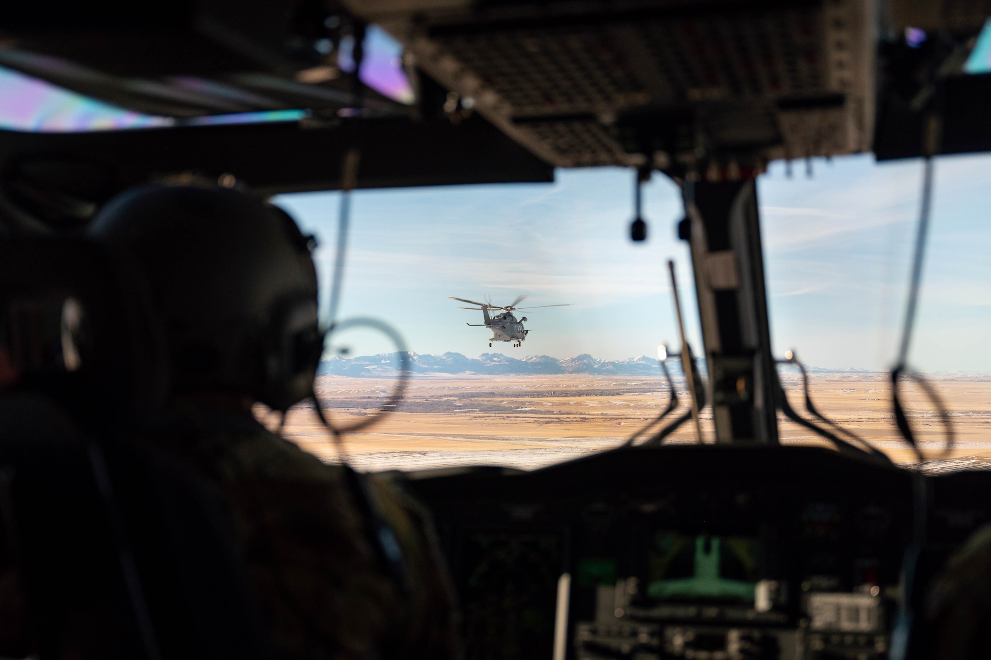 A helicopter flies over Great Falls, MT.