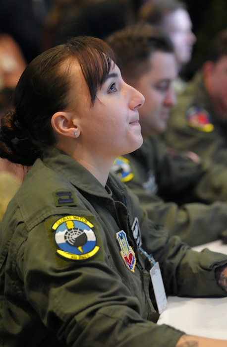 photo of US military member works on a computer