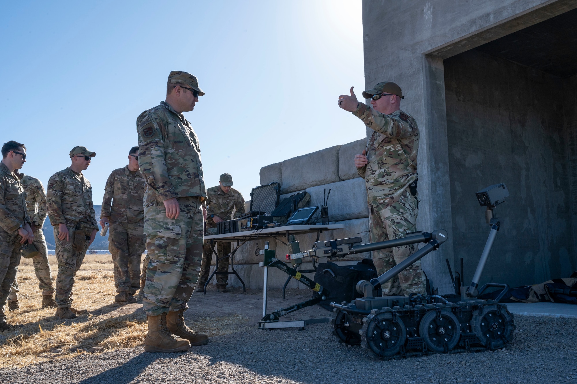 A man looks at equipment.