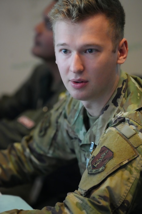 photo of US Airman working on a computer