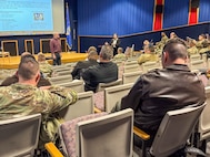 Evelyn Ryberg, the Air Force Life Cycle Management Center C-5 product support manager, answers questions from C-5 community stakeholders as part of a “Drive to 55” campaign event at Joint Base San Antonio-Lackland, Texas on Jan. 14, 2025.
