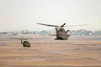 A helicopter flies over Great Falls, MT.