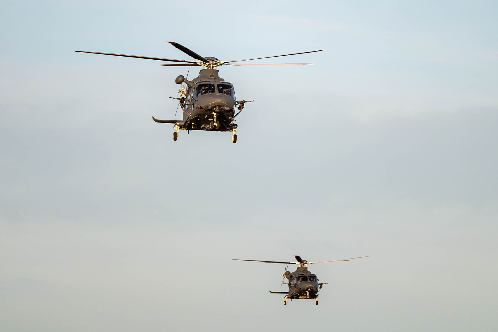 Two helicopters fly over Great Falls, MT.