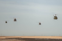 Four helicopters fly over Great Falls, MT.