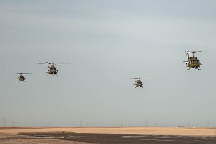 Four helicopters fly over Great Falls, MT.