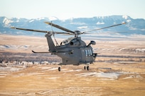 A helicopter flies over Great Falls, MT.
