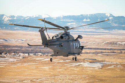 A helicopter flies over Great Falls, MT.