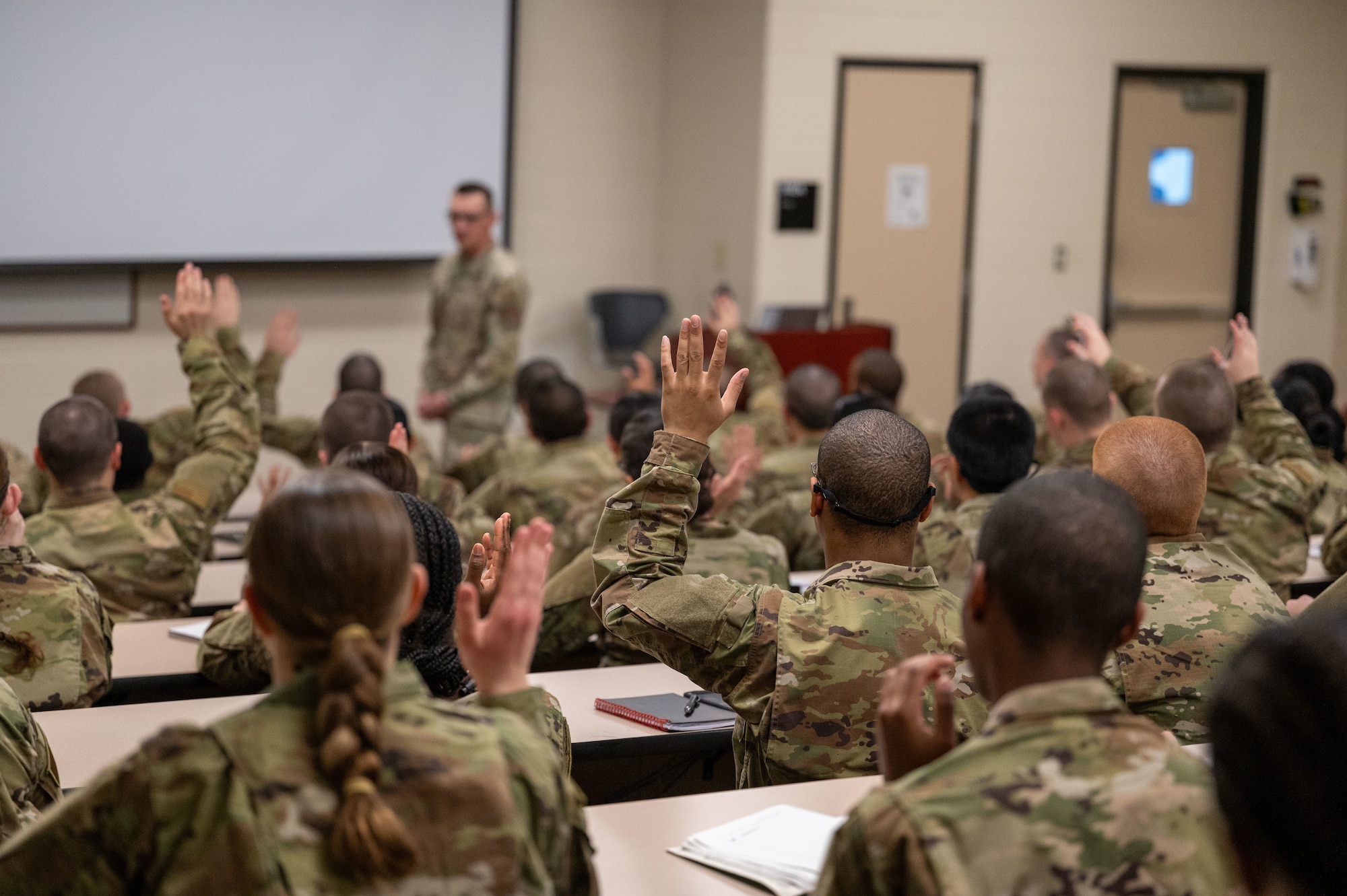 U.S. Air Force Tech. Sgt. Allan Zajac, training NCOIC for the 323rd Training Squadron, facilitates guided discussion about Airmindedness to basic military trainees during Zero Week, at Joint Base San Antonio-Lackland, Texas. (U.S. Air Force photo by 2nd Lt. Kate Anderson)