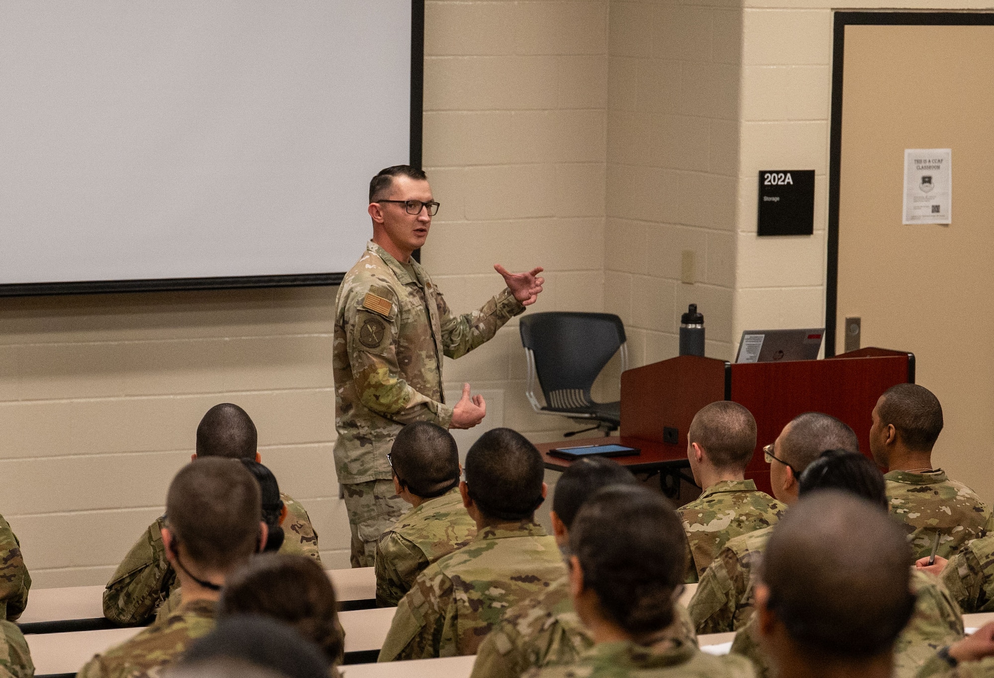 U.S. Air Force Tech. Sgt. Allan Zajac, training NCOIC for the 323rd Training Squadron, facilitates guided discussion about Airmindedness during Basic Military Training’s, or BMT, Zero Week, at Joint Base San Antonio-Lackland, Texas. The Airmindedness training encompasses various historical elements, highlighting significant achievements and milestones in Air Force history, including the stories of the Tuskegee Airmen and Women Air Service Pilots. (U.S. Air Force photo by 2nd Lt. Kate Anderson)