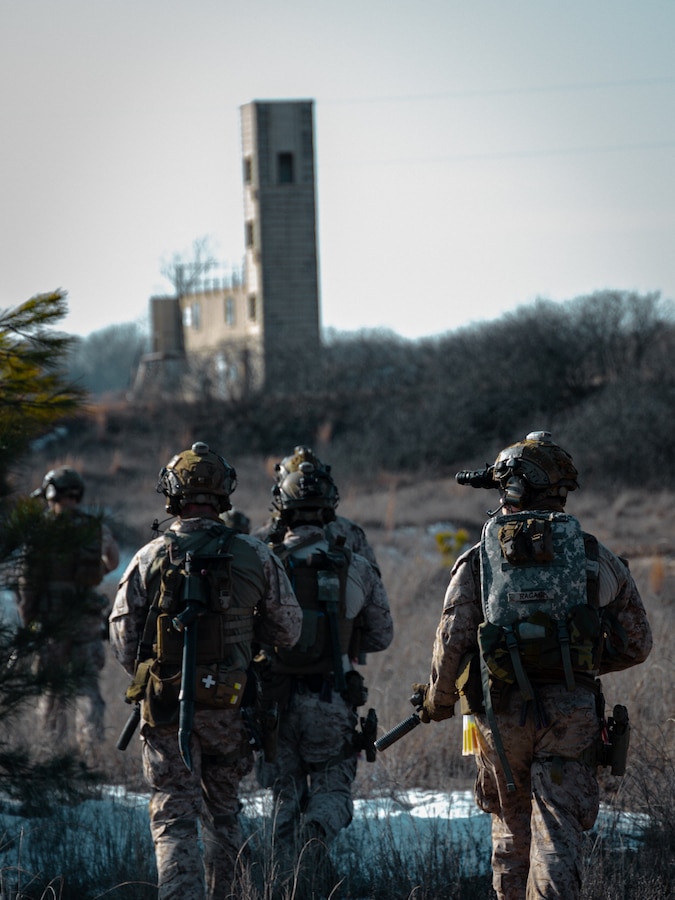 U.S. Marines with Maritime Special Purpose Force, 22nd Marine Expeditionary Unit, conduct a live-fire close quarters battle exercise in support of the Marine Expeditionary Unit Exercise at the Tier 1 Group compound near Memphis, Tennessee, Jan. 15, 2025. MEUEX is the 22nd MEU's first large-scale exercise as a composited Marine Air-Ground Task Force, focusing on split operations with consolidated command and control to enhance readiness for its upcoming deployment. (U.S. Marine Corps photo by Sgt. Tanner Bernat)