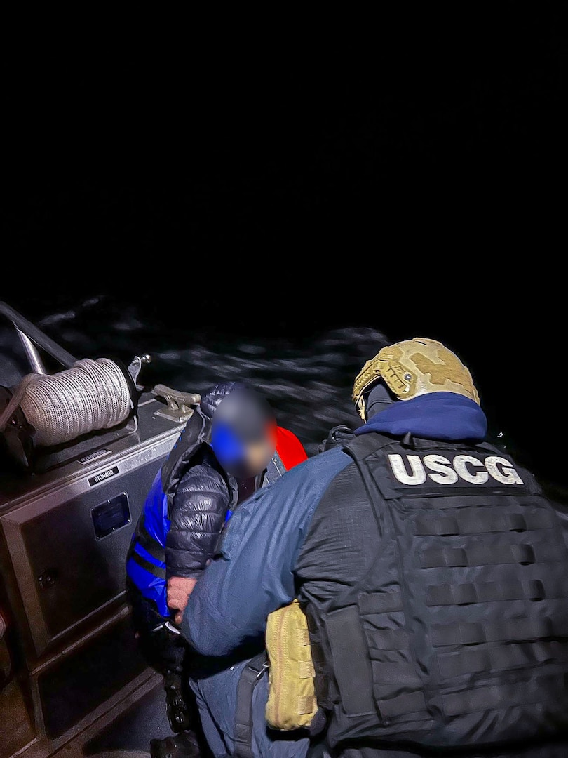 Coast Guard members interdict three aliens aboard a personal watercraft near Mission Bay.