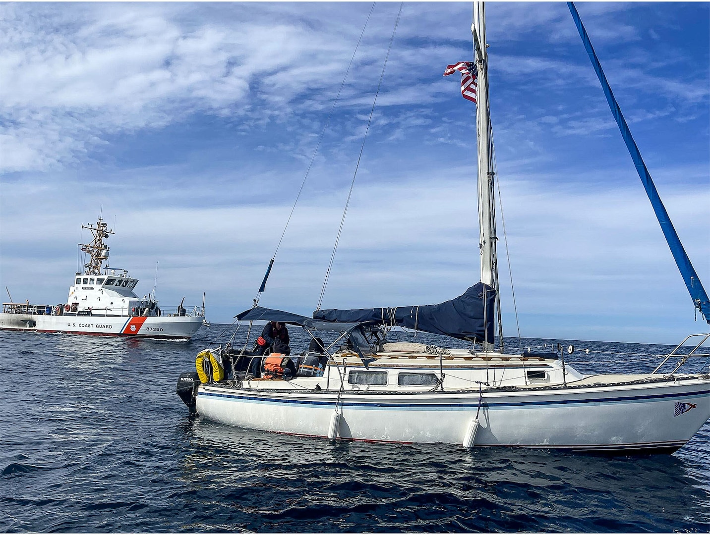 U.S. Coast Guard Cutter Petrel (WPB-87350) interdicts a 25-foot sailboat with aliens off the coast of San Diego, near Point Loma, Calif., Feb. 9, 2025.  The 12 aliens were detained by the small boat boarding team to be transferred to Imperial Beach Border Patrol. (U.S. Coast Guard photo taken courtesy by USCGC Petrel/released).