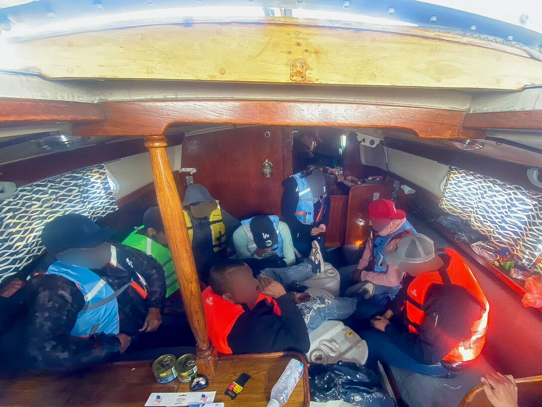 U.S. Coast Guard Cutter Petrel (WPB-87350) interdicts a 25-foot sailboat with aliens off the coast of San Diego, near Point Loma, Calif., Feb. 9, 2025.  The 12 aliens were detained by the small boat boarding team to be transferred to Imperial Beach Border Patrol. (U.S. Coast Guard photo taken courtesy by USCGC Petrel/released).