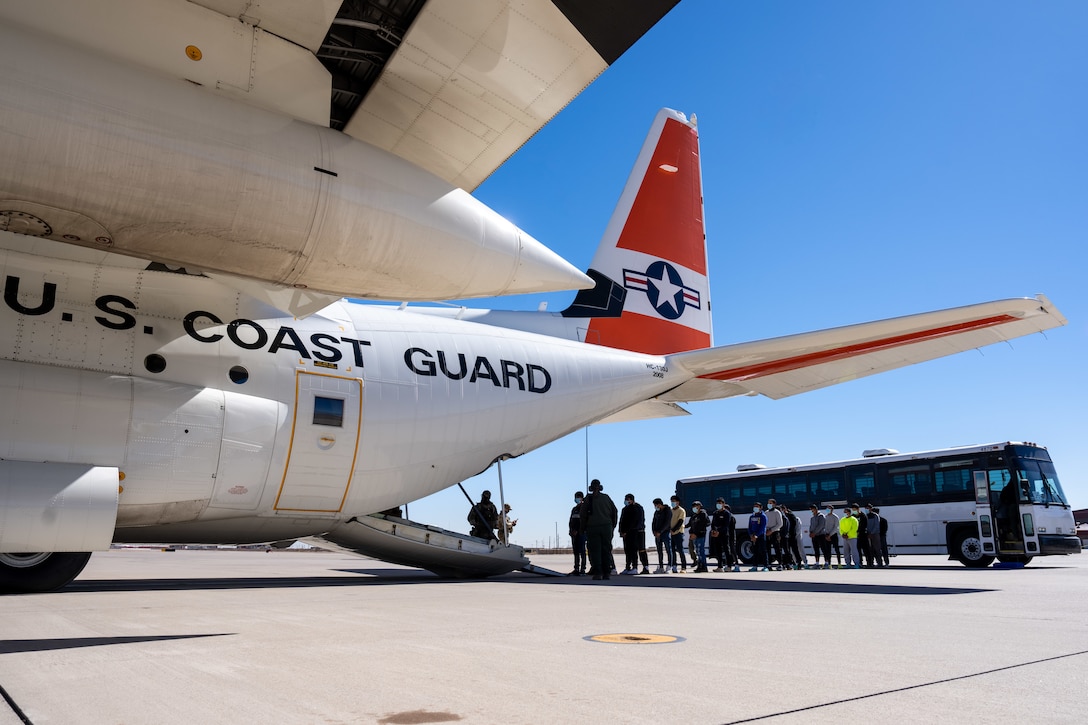 A U.S. Coast Guard C-130 Hercules crew prepares for an alien expulsion flight in San Diego, California, Feb. 9, 2025.