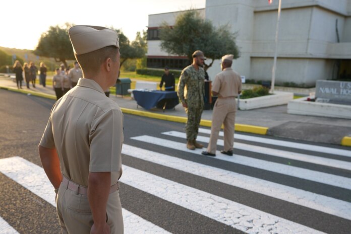 U.S. NMRTC Sigonella Executive Officer, Captain Michael Mercado, stands at attention as he observes the January 24th awards ceremony