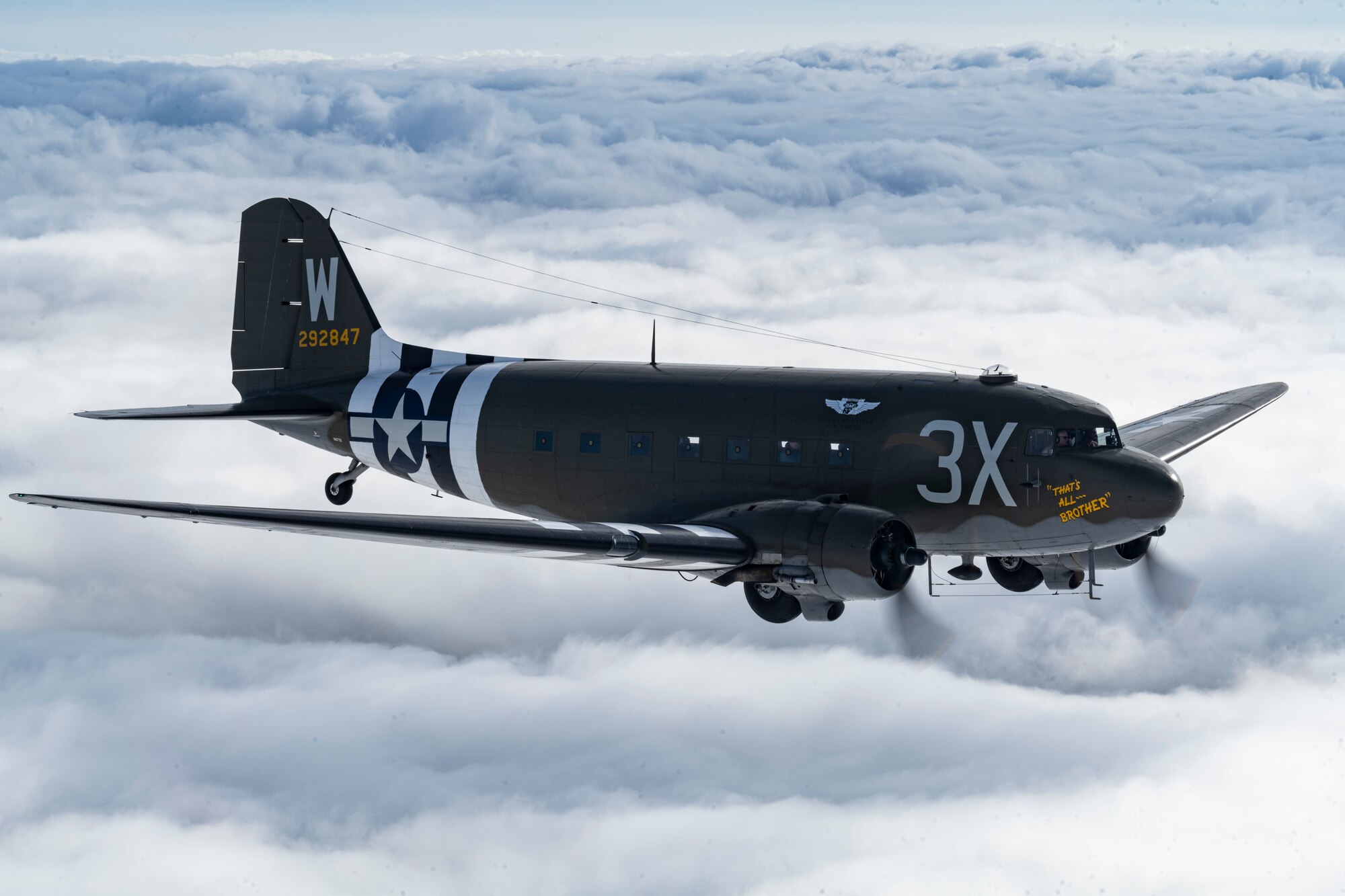 A Douglas C-47 Skytrain aircraft “That’s All, Brother” flies over France in support of the 80th Anniversary of D-Day, June 4, 2024. “