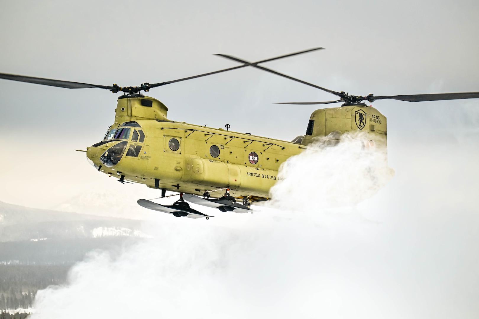 An Alaska Army National Guard CH-47F Chinook assigned to 2nd General Support Aviation Battalion, 211th Aviation Regiment, operates Feb. 2, 2025, at the Whitehorse airport, Yukon Territory, Canada. The Chinook crew supported the repair of a 210th Rescue Squadron HH-60G Pave Hawk that had rescued two victims of a Jan. 26 ultralight plane crash near Faro, Yukon Territory.