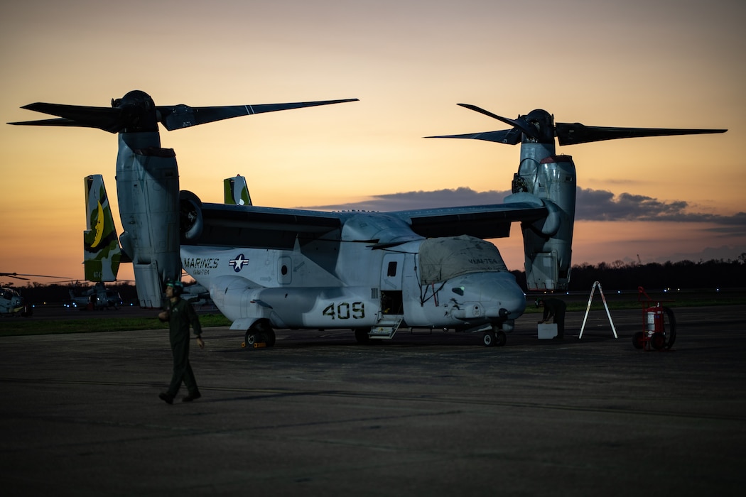 U.S. Marines with Marine Medium Tiltrotor Squadron (VMM) 774, Marine Aircraft Group 49, 4th Marine Aircraft Wing, performs a post-flight inspection an MV-22 Osprey, tiltrotor aircraft, before a rehearsal flight, Naval Air Station Joint Reserve Base New Orleans, Belle Chasse, Louisiana, Feb. 7, 2025. The Marine Corps is the lead service for Super Bowl LIX flyover, participating in multiple events throughout the week exhibiting pride leading up to the U.S. Marine Corps 250th birthday. (U.S. Marine Corps photo by Sgt. Scott Jenkins)