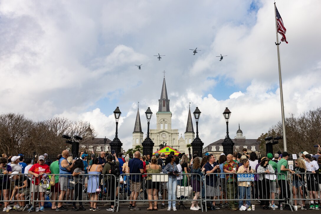 U.S. Marine Corps aircraft with Marine Light Attack Helicopter Squadron (HMLA) 773 fly over Jackson Square during the Super Bowl LIX parade, New Orleans, Feb. 8, 2025. The Marine Corps is the lead service for Super Bowl LIX, participating in multiple events throughout the week exhibiting pride leading up to the U.S. Marine Corps’ 250th birthday. (U.S. Marine Corps photo by Sgt. Scott Jenkins)