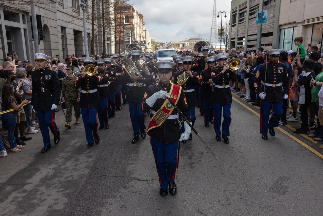 The Marine Forces Reserve Band marches through the city during the Super Bowl LIX parade, New Orleans, Feb. 8, 2025. The Marine Corps is the lead service for Super Bowl LIX, participating in multiple events throughout the week exhibiting pride leading up to the U.S. Marine Corps’ 250th birthday. (U.S. Marine Corps photo by Sgt. Scott Jenkins)