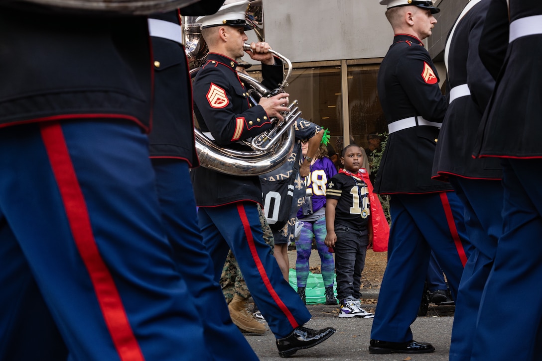 The Marine Forces Reserve Band marches through the city during the Super Bowl LIX parade, New Orleans, Feb. 8, 2025. The Marine Corps is the lead service for Super Bowl LIX, participating in multiple events throughout the week exhibiting pride leading up to the U.S. Marine Corps’ 250th birthday. (U.S. Marine Corps photo by Sgt. Scott Jenkins)