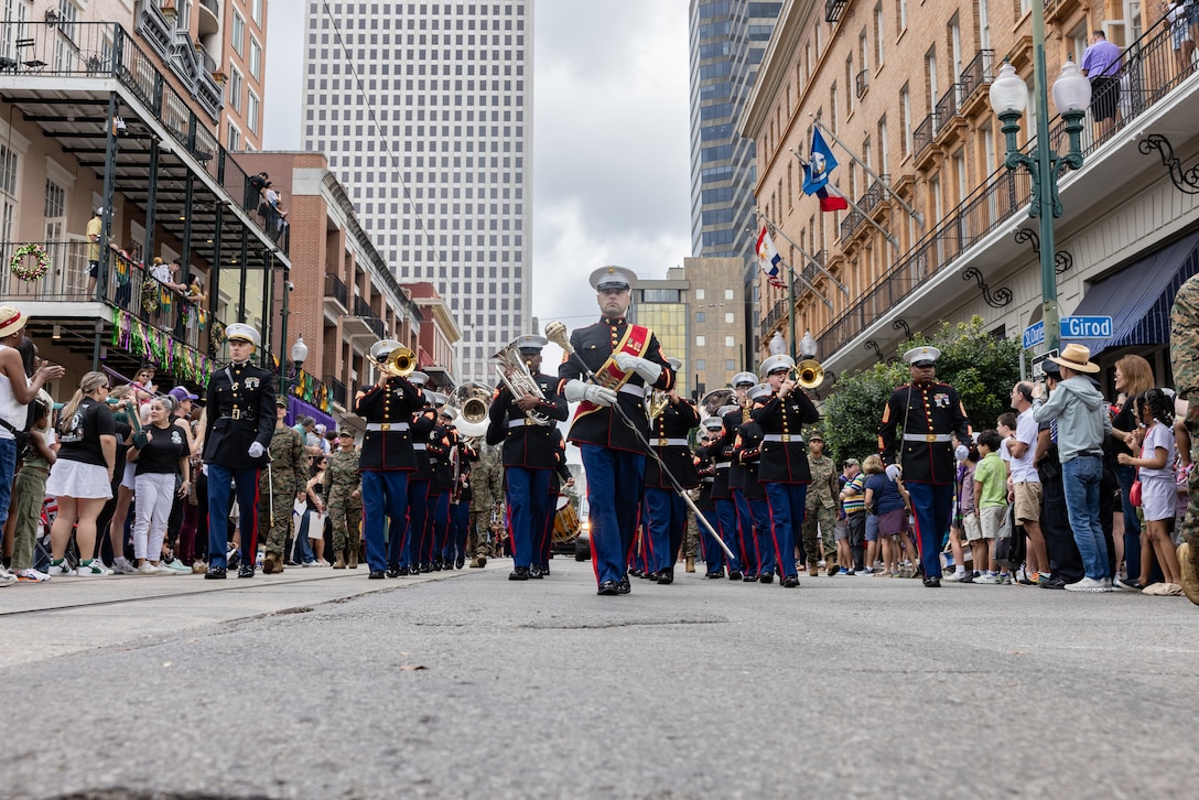 The Marine Forces Reserve Band marches through the city during the Super Bowl LIX parade, New Orleans, Feb. 8, 2025. The Marine Corps is the lead service for Super Bowl LIX, participating in multiple events throughout the week exhibiting pride leading up to the U.S. Marine Corps’ 250th birthday. (U.S. Marine Corps photo by Sgt. Scott Jenkins)