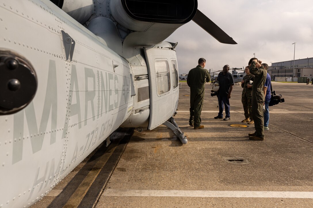 U.S. Marines with Marine Light Attack Helicopter Squadron (HMLA) 773, Marine Air Group 49, 4th Marine Aircraft Wing, brief members of the media before a flyover for the Super Bowl LIX parade, New Orleans, Feb. 8, 2025. The Marine Corps is the lead service for Super Bowl LIX, participating in multiple events throughout the week exhibiting pride leading up to the U.S. Marine Corps' 250th Birthday. (U.S. Marine Corps photo by Cpl. Aaron TorresLemus)