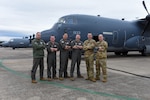 The aircrew for an EC-130J assigned to the 189th Airlift Wing poses for a group photo Feb. 7, 2025. The crew conducted the first training flight in a J-model C-130 for the Arkansas Air National Guard, an important step toward fleet modernization for the Air National Guard.