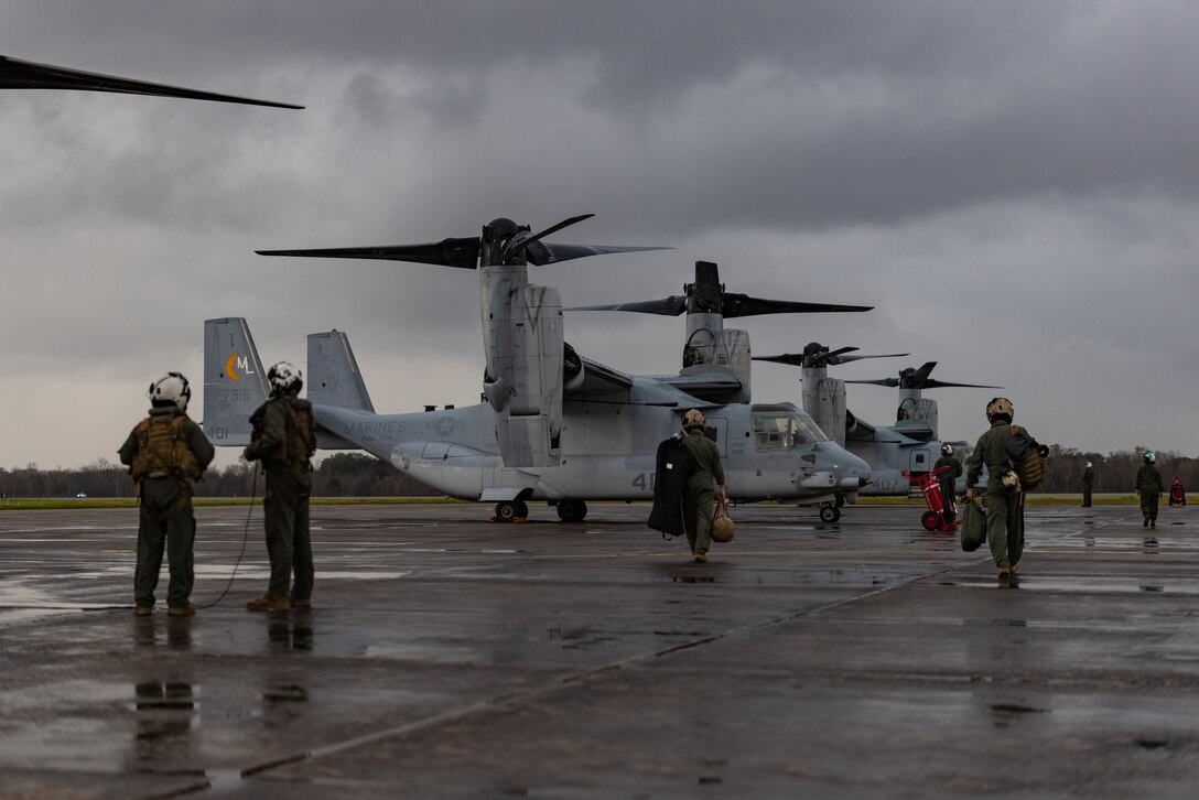 U.S. Marines with Marine Medium Tiltrotor Squadron (VMM) 774, Marine Aircraft Group 49, 4th Marine Aircraft Wing, board MV-22B Ospreys, tiltrotor aircraft, Naval Air Station Joint Reserve Base New Orleans, Belle Chasse, Louisiana, Feb. 9, 2025. The Marine Corps is the lead service for Super Bowl LIX flyover, participating in multiple events throughout the week exhibiting pride leading up to the U.S. Marine Corps 250th birthday. (U.S. Marine Corps photo by Sgt. Scott Jenkins)
