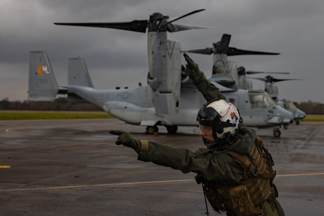 U.S. Marine Corps Cpl. Robert Huffstutler, a crew chief with Marine Medium Tiltrotor Squadron (VMM) 774, Marine Aircraft Group 49, 4th Marine Aircraft Wing, inspects an MV-22B Osprey, tiltrotor aircraft, Naval Air Station Joint Reserve Base New Orleans, Belle Chasse, Louisiana, Feb. 9, 2025. The Marine Corps is the lead service for Super Bowl LIX flyover, participating in multiple events throughout the week exhibiting pride leading up to the U.S. Marine Corps 250th birthday. (U.S. Marine Corps photo by Sgt. Scott Jenkins)