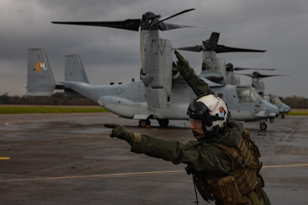 U.S. Marine Corps Cpl. Robert Huffstutler, a crew chief with Marine Medium Tiltrotor Squadron (VMM) 774, Marine Aircraft Group 49, 4th Marine Aircraft Wing, inspects an MV-22B Osprey, tiltrotor aircraft, Naval Air Station Joint Reserve Base New Orleans, Belle Chasse, Louisiana, Feb. 9, 2025. The Marine Corps is the lead service for Super Bowl LIX flyover, participating in multiple events throughout the week exhibiting pride leading up to the U.S. Marine Corps 250th birthday. (U.S. Marine Corps photo by Sgt. Scott Jenkins)