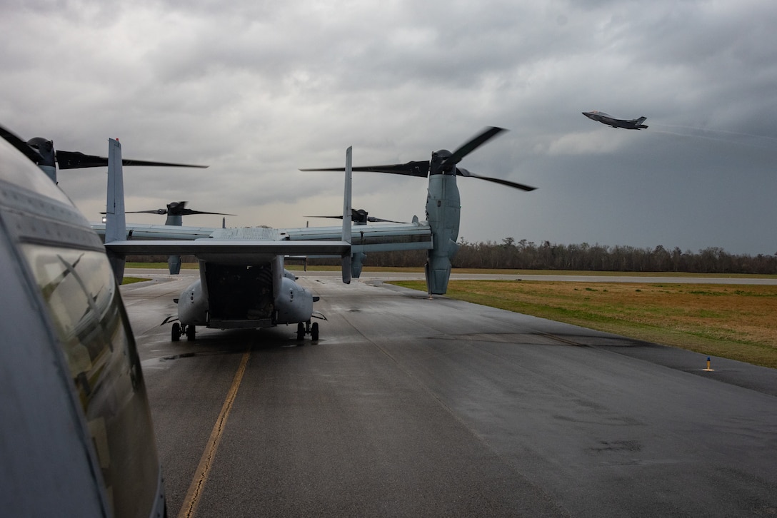 U.S. Marine Corps F-35B Lightning II aircraft with Marine Fighter Attack Squadron (VMFA) 542 and MV-22B Ospreys, tiltrotor aircraft, with Marine Medium Tiltrotor Squadron (VMM) 774 and VMM-764 take off on Naval Air Station Joint Reserve Base New Orleans, Belle Chasse, Louisiana, Feb. 9, 2025. The Marine Corps is the lead service for Super Bowl LIX flyover, participating in multiple events throughout the week exhibiting pride leading up to the U.S. Marine Corps 250th birthday. (U.S. Marine Corps photo by Sgt. Scott Jenkins)