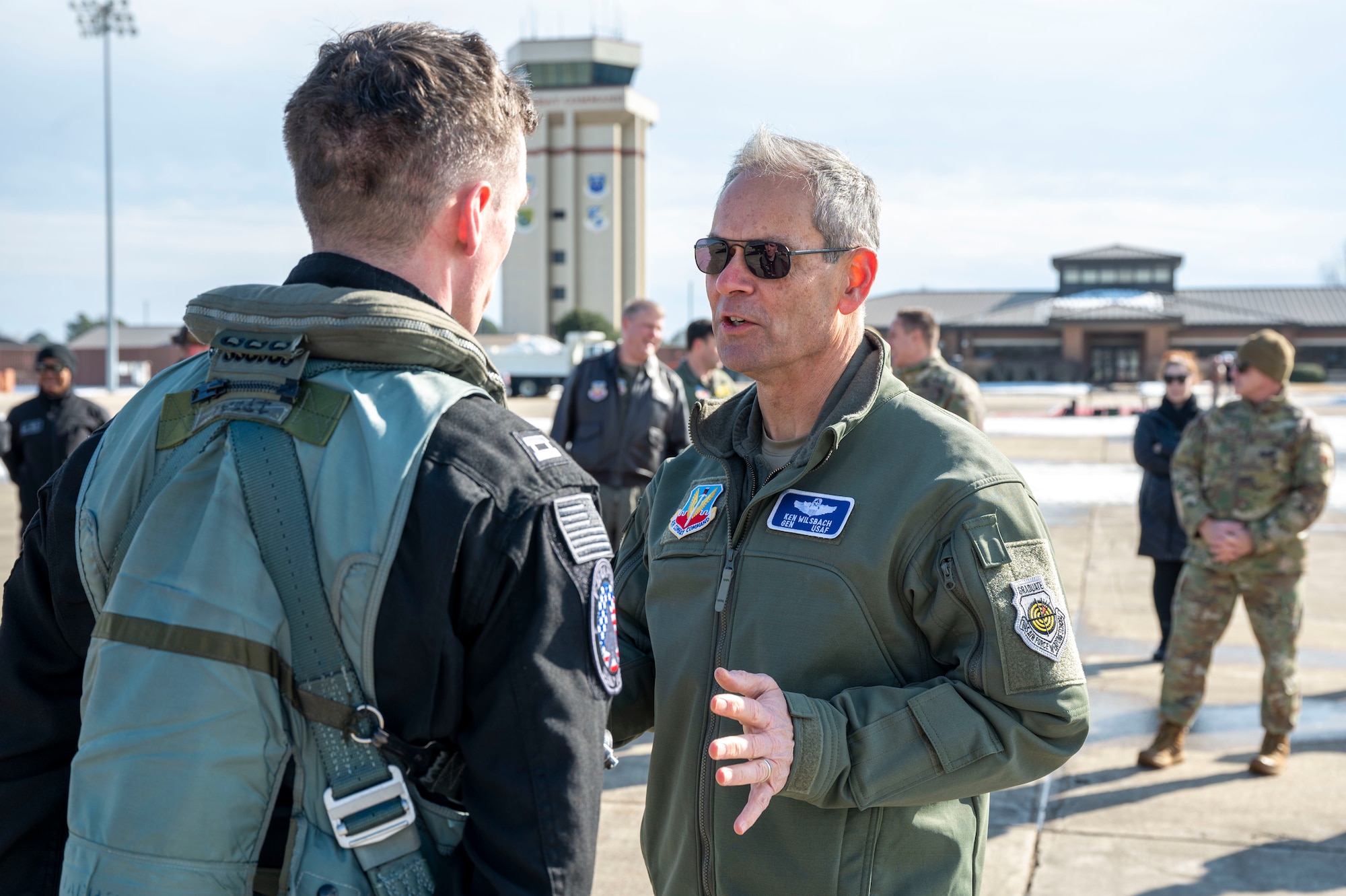 LANGLEY AIR FORCE BASE, Va. -- U.S. Air Force Gen. Ken Wilsbach, commander of Air Combat Command, speaks to Capt. Nick “Laz” Le Tourneau, F-22 Raptor Demonstration Team commander and pilot, following the team’s certification flight at Joint Base Langley-Eustis, Virginia, Jan. 24, 2025. Following the beginning of his Air Force career in 2018, Le Tourneau has over 750 flying hours in various airframes such as the T-6 Texan, T-38 Talon and F-22 Raptor. (U.S. Air Force photo by Tech Sgt. Matthew Coleman-Foster)