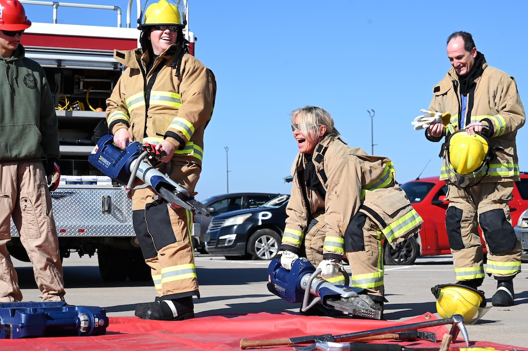 The 17th Training Wing Honorary Commanders learn to operate standard equipment found in emergency responder equipment at the Louis F. Garland Department of Defense Fire Academy during their 17th Training Group immersion, Goodfellow Air Force Base, Texas, Feb. 6, 2025. The equipment included devices used for vehicular extraction exercises such as the Jaws of Life. (U.S. Air Force photo by Senior Airman Madi Collier)