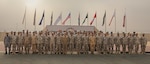 Service members from the United States military, Qatari Armed Forces, Royal Saudi Armed Forces, Royal Army of Oman, United Arab Emirates Armed Forces, Bahrain Defence Force, and Kuwait Military Force, pose for a group photo, during Exercise Eagle Resolve 2025 (ER25) within the U.S. Central Command area of responsibility on Jan. 16, 2025. The exercise will refine command and control systems in a multi-service, international environment

and strengthen collective capabilities. (U.S. Army photo by Sgt. Mebea Demelash)