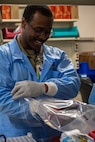 U.S. Air Force Staff Sgt. Shamar Young, 5th Medical Operations Squadron laboratory technician, prepares blood specimens for shipment at Minot Air Force Base, North Dakota, Jan. 29, 2025. The blood specimens are collected at Minot AFB and then shipped offsite to be tested. (U.S. Air Force photo by Senior Airman Alyssa Bankston)