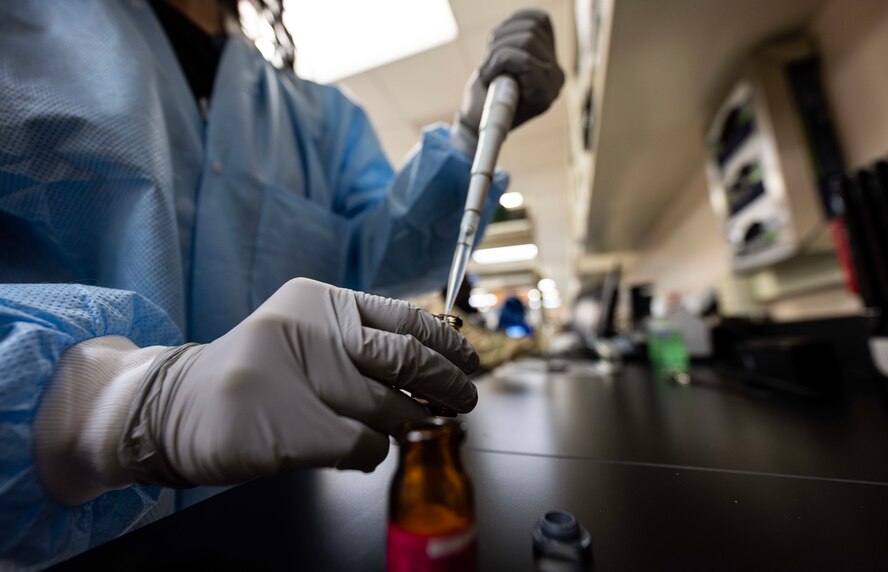 Luisa Rodriguez, 5th Medical Operations Squadron laboratory technician, prepares chemistry quality control material at Minot Air Force Base, North Dakota, Jan. 29, 2025. Chemistry quality control is conducted to prevent defective products from reaching the customer. (U.S. Air Force photo by Senior Airman Alyssa Bankston)