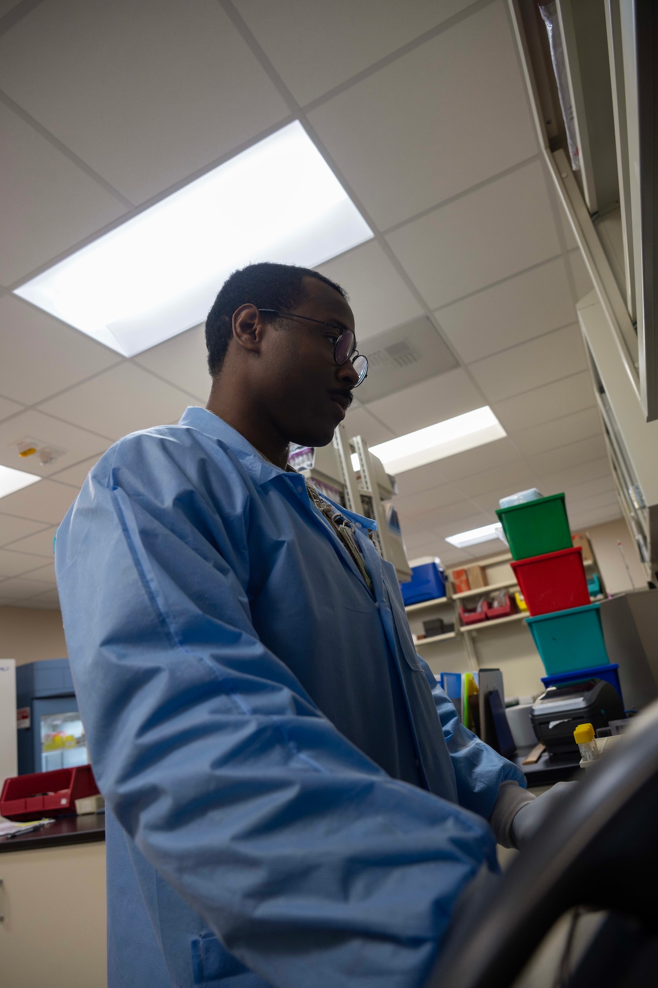 U.S. Air Force Staff Sgt. Shamar Young, 5th Medical Operations Squadron laboratory technician, logs blood specimens in preparation for shipment at Minot Air Force Base, North Dakota, Jan. 29, 2025. Responsibilities of a laboratory technician include drawing blood and conducting chemistry examinations. (U.S. Air Force photo by Senior Airman Alyssa Bankston)