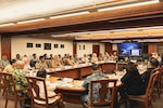 Guam Gov. Lourdes Leon Guerrero and Rear Adm. Greg Huffman, commander of Joint Task Force-Micronesia, convene the Civil-Military Coordination Council (CMCC) at the Ricardo J. Bordallo Complex in Adelup, Guam, Feb. 5, 2025. Council members observed a FEM-02 presentation, which provided updates on key developments and initiatives. The CMCC fosters collaboration among the Department of Defense, local government, and federal agencies by sharing information, discussing key issues to address military activity and growth while minimizing impact on community infrastructure and services. (U.S. Navy photo by William J Busby III)