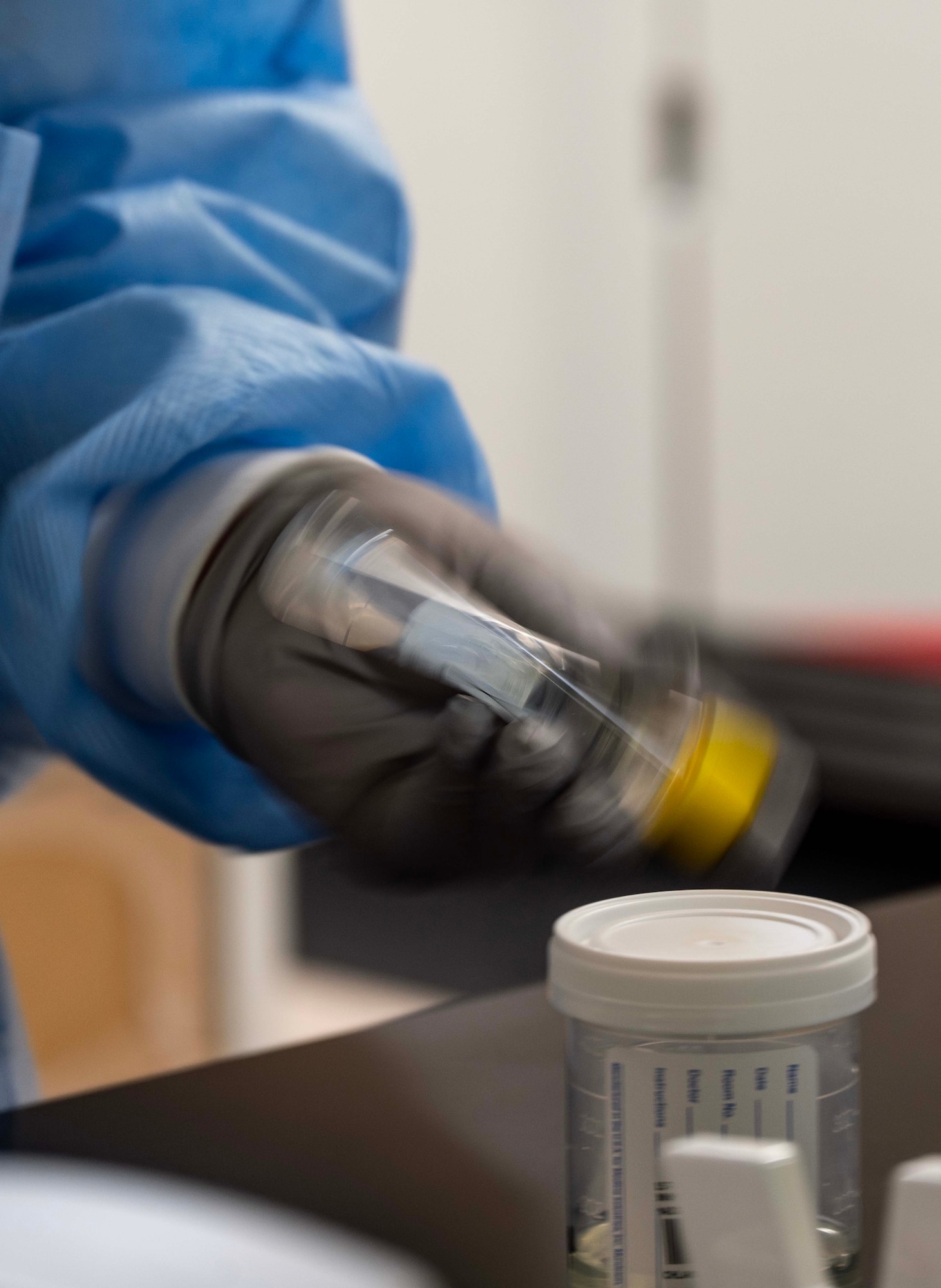 Luisa Rodriguez, 5th Medical Operations Squadron laboratory technician, prepares urine specimens at Minot Air Force Base, North Dakota, Jan. 29, 2025. Laboratory technicians' responsibilities include receiving, testing, analyzing, recording and reporting the results of their tests. (U.S. Air Force photo by Senior Airman Alyssa Bankston)