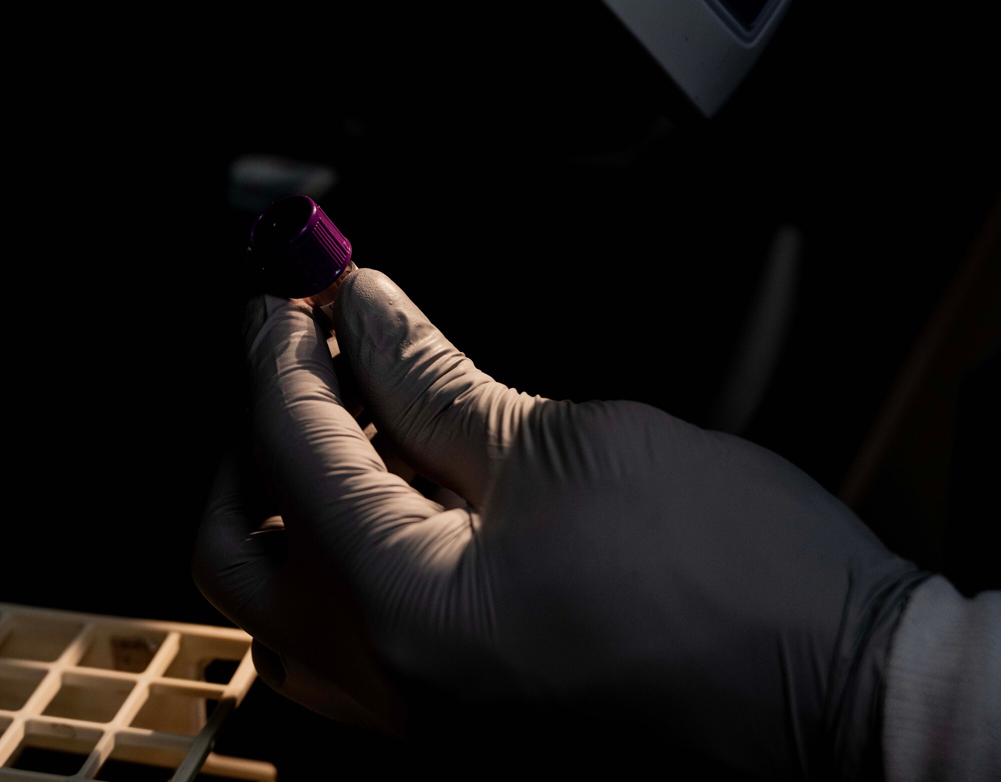 U.S. Air Force Staff Sgt. Shamar Young, 5th Medical Operations Squadron laboratory technician, scans blood specimens in preparation for shipment at Minot Air Force Base, North Dakota, Jan. 29, 2025. The samples are collected here at Minot AFB and then shipped offsite to be tested. (U.S. Air Force photo by Senior Airman Alyssa Bankston)