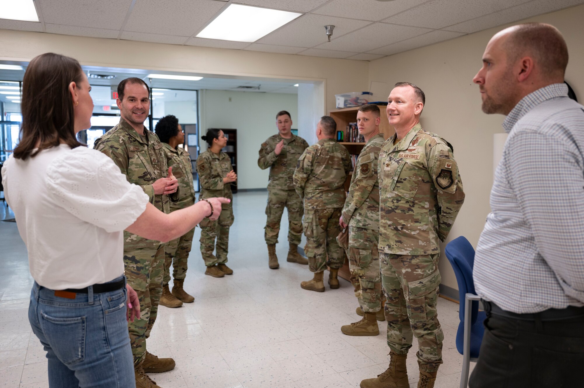 A group speaks with each other.