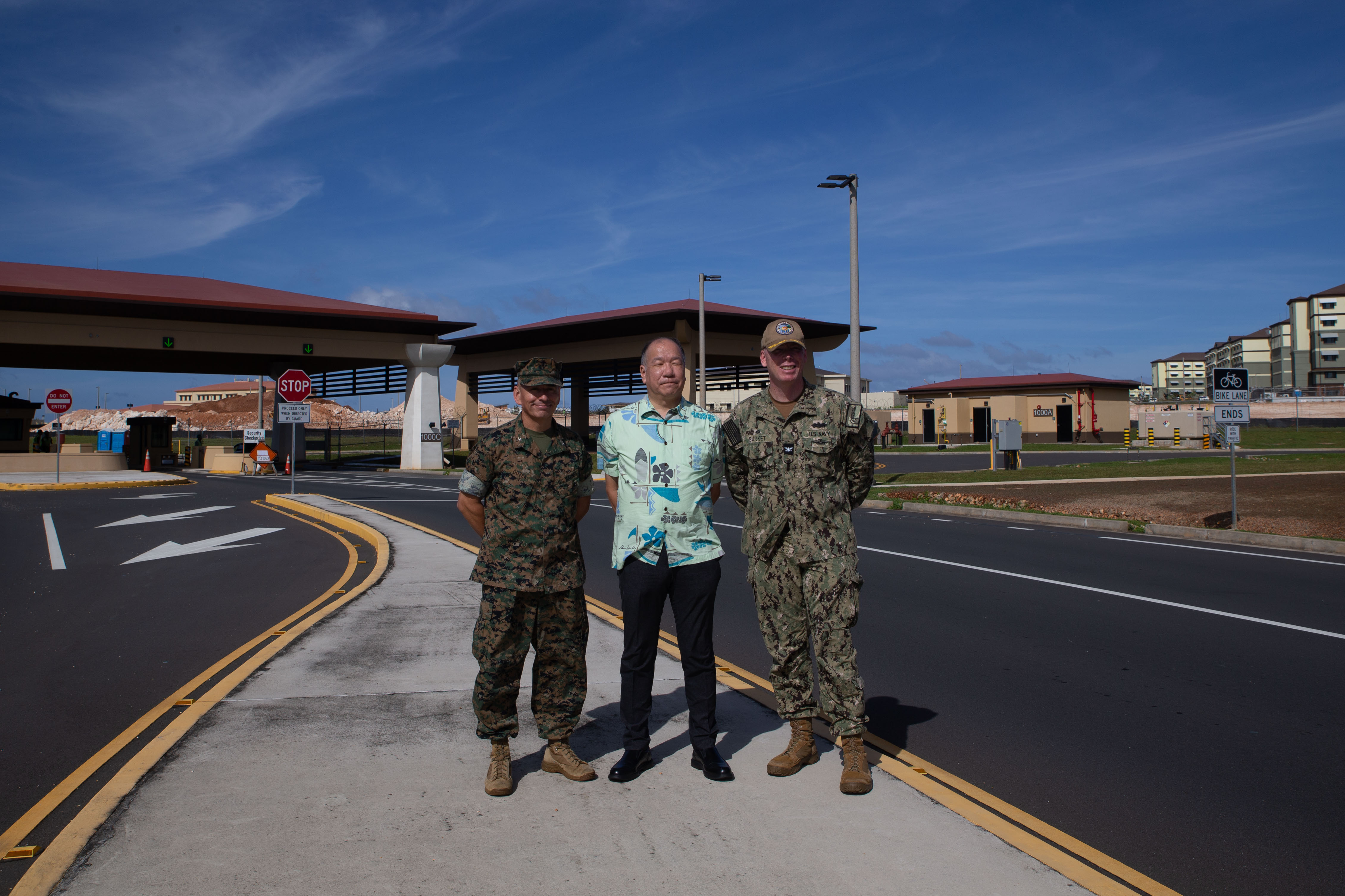 U.S. Marine Corps Col. Ernest Govea, commanding officer, Marine Corps Base Camp Blaz, the Honorable Susumu Ueda, Consul General, Consulate-General of Japan Hagåtña, and U.S. Navy Capt. Blake Burket, commanding officer, Officer in Charge of Construction, pose for a group photo on MCB Camp Blaz, Guam, Jan. 31, 2025. The Consulate-General of Japan visited MCB Camp Blaz to see construction progress. (U.S. Marine Corps photo by Lance Cpl. Afton Smiley)