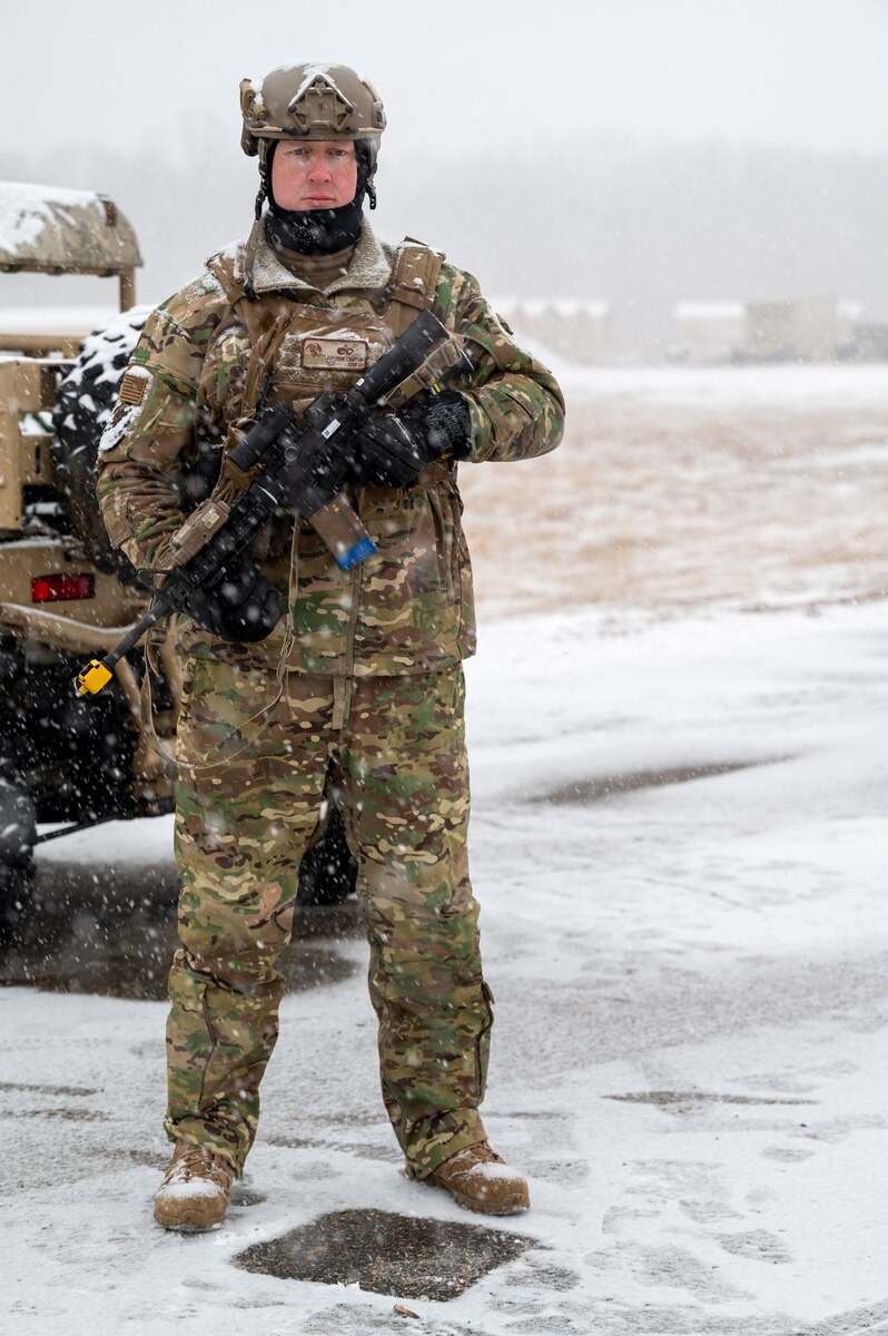 Airman stands guard